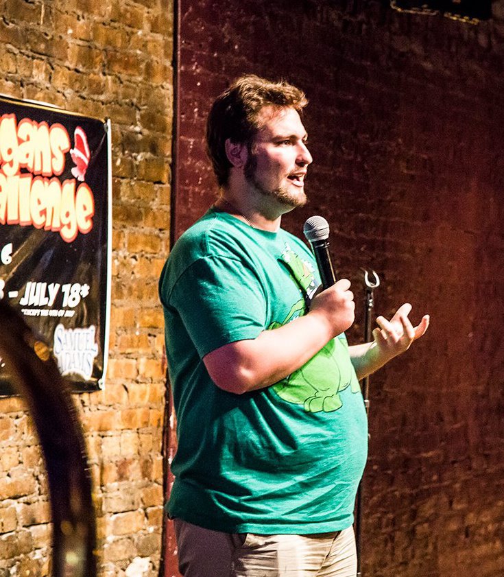 Bryan Charles Vish performing stand-up comedy in Chicago.